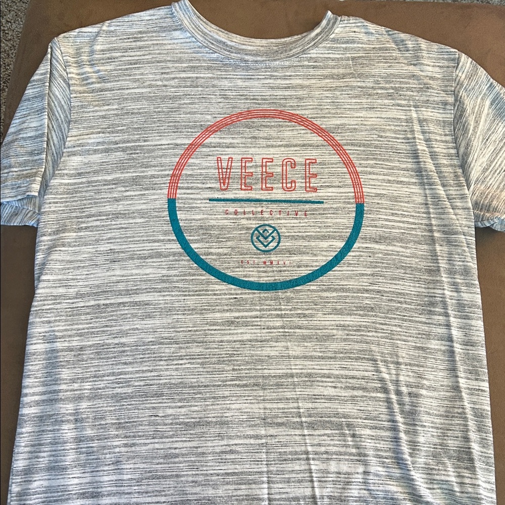 Veece Gray Graphic T-Shirt
Adult Small
Never worn